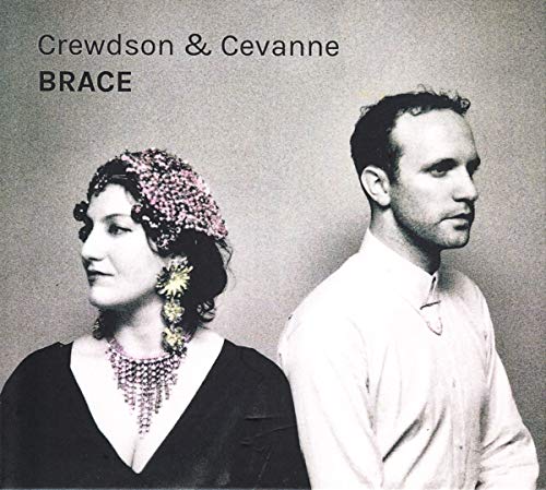 CD cover: portraits of a woman with flowers and a man.
