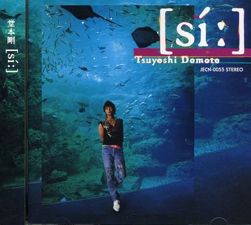 CD cover featuring Tsuyoshi Domoto in an aquarium with fish.