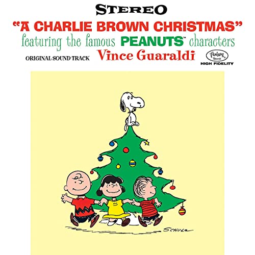 “A Charlie Brown Christmas” CD cover with Snoopy and Peanuts characters.