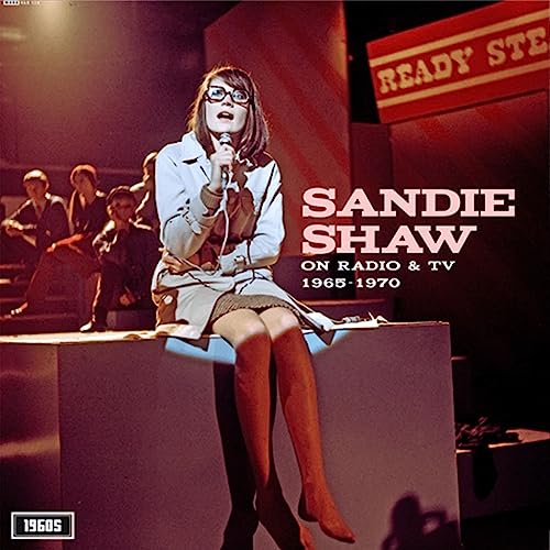 Sandie Shaw album cover, 1965-1970, featuring the singer in a white coat.