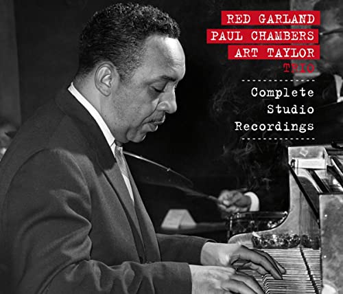 Black and white photo of Red Garland playing piano, album cover.