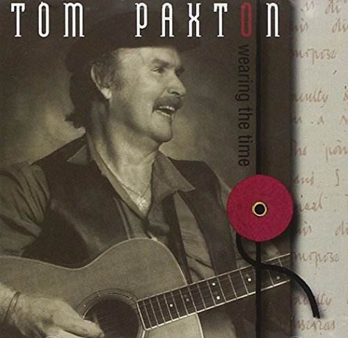 Tom Paxton smiling with guitar on album cover, "Wearing The Time.