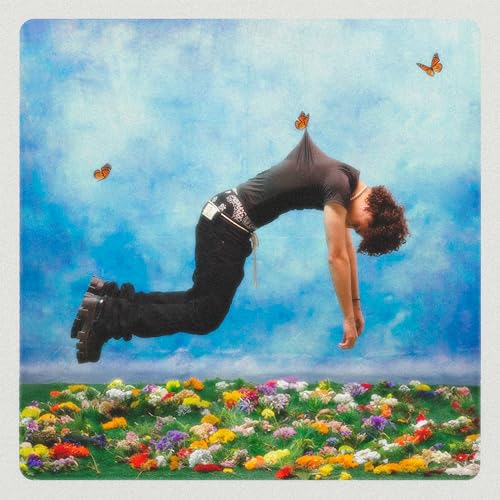 Person arching backwards over a field of flowers with butterflies.