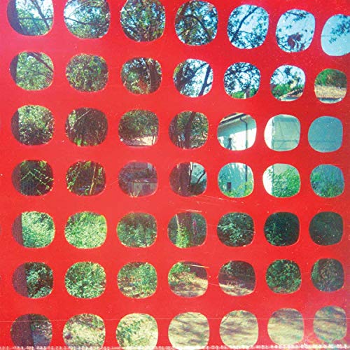 Red vinyl record cover with many circular photos of trees.