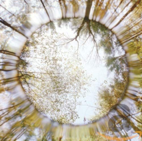 Circular view of trees and sky, with a CD graphic in the corner.