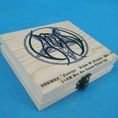 Wooden box with a circular design and text, containing a 3-CD music set.
