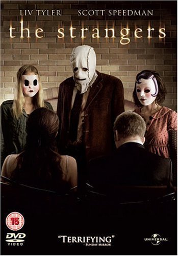 DVD cover for The Strangers featuring three masked figures standing behind a seated couple.