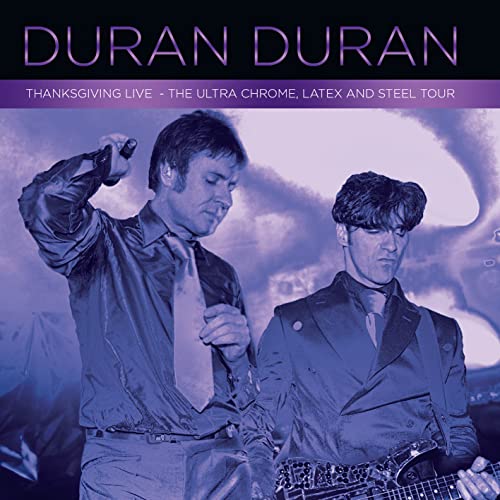 Duran Duran album cover featuring Simon Le Bon and John Taylor in concert.