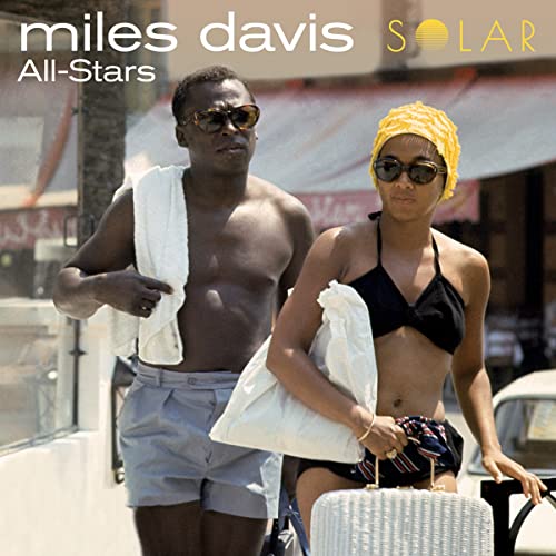 Miles Davis and a woman in swimwear walking outdoors, with album text overlay.