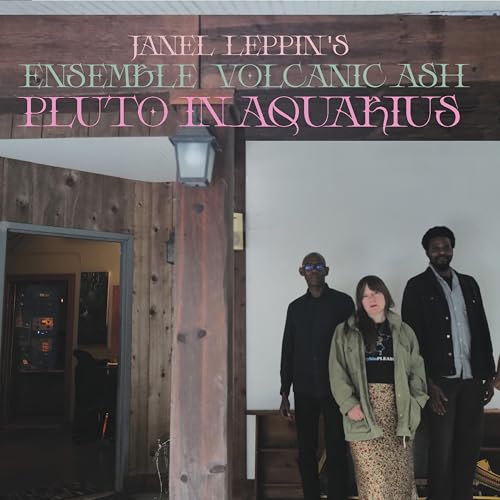 Album cover featuring three people standing in front of a building.