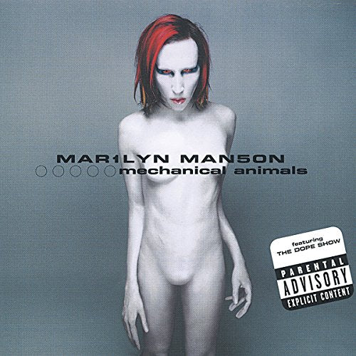 Marilyn Manson with red-streaked hair and pale skin on Mechanical Animals album cover.