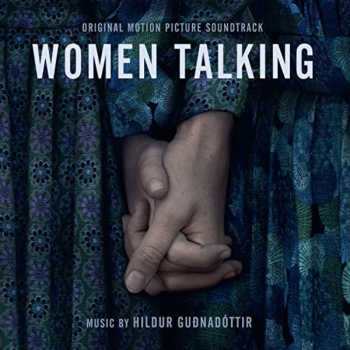 “Women Talking” soundtrack CD cover with clasped hands and floral pattern.