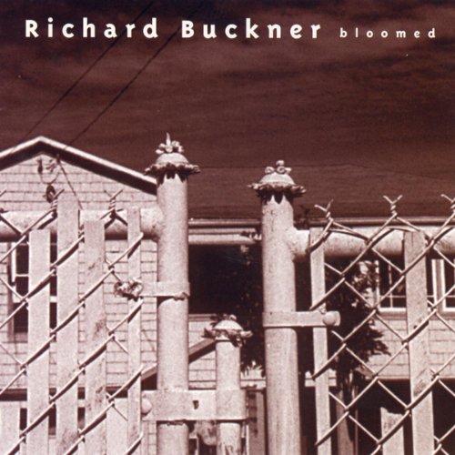 CD cover: house behind a fence with ornate metal posts.
