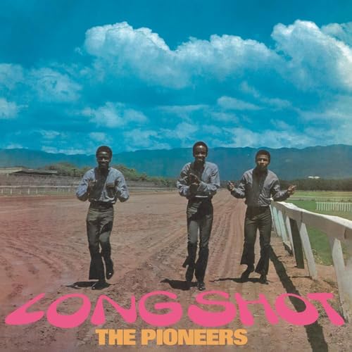 Album cover: three men standing in a field under a cloudy sky.