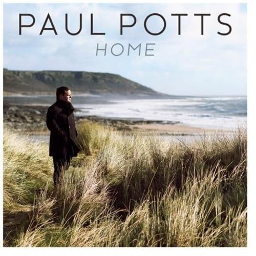 CD cover for "Home" featuring Paul Potts standing in a coastal landscape.