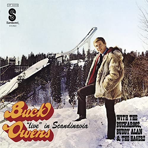 Album cover featuring Buck Owens in a fur coat with a ski jump backdrop.