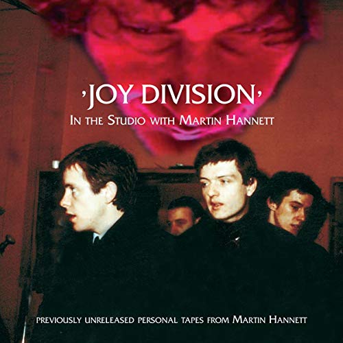 Joy Division album cover: band members and red, blurred portrait.