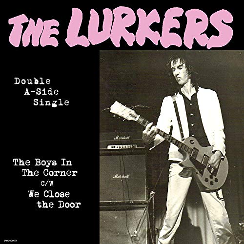 Record cover featuring a guitarist performing on stage, band name "The Lurkers".