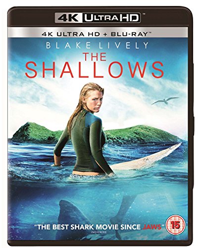 Blu-ray cover for "The Shallows" featuring a surfer and shark fin.
