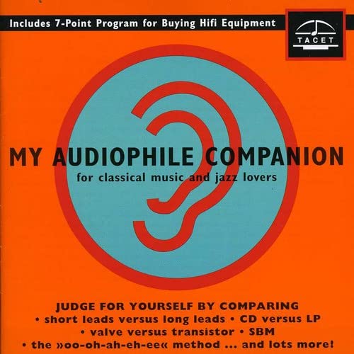 CD cover: orange background with a blue and red ear graphic and text.