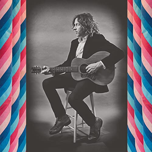Black and white album cover featuring Doug Paisley with an acoustic guitar.