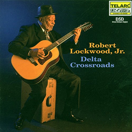 Robert Lockwood Jr. album cover: blues musician playing acoustic guitar.