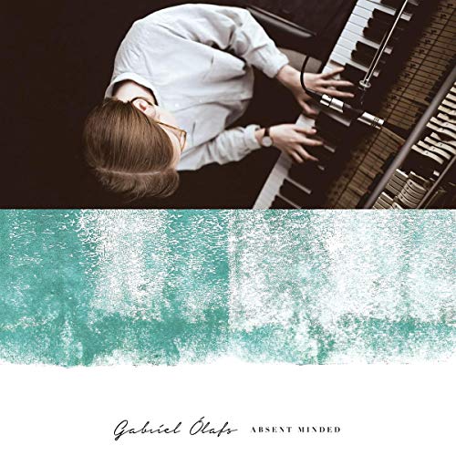 Man playing piano from above, with a blurred teal wave below.