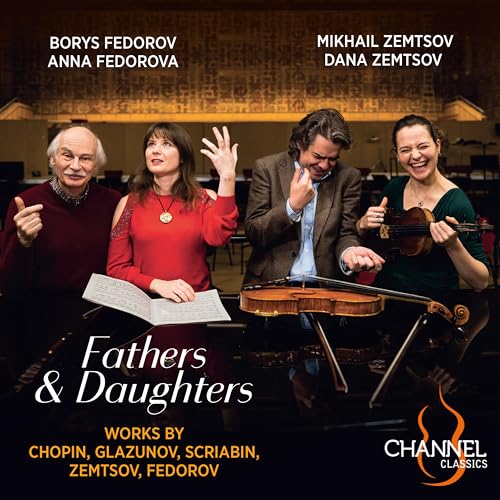 Four musicians pose with instruments and sheet music for “Fathers & Daughters.”