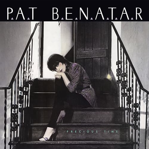 Pat Benatar album cover, black and white photo of a woman on stairs.
