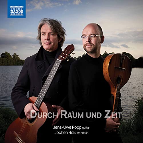 CD cover featuring two men with guitars in a landscape setting.