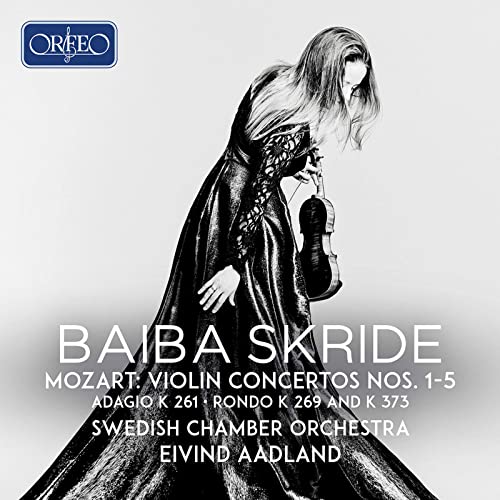 Classical CD cover featuring violinist Baiba Skride in a flowing gown.
