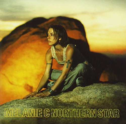 Melanie C album cover, "Northern Star," showing her on rocky terrain.