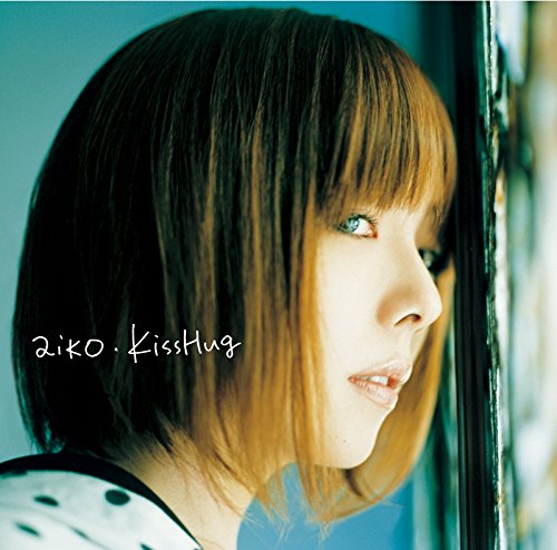 CD cover featuring a woman with layered black and blonde hair.