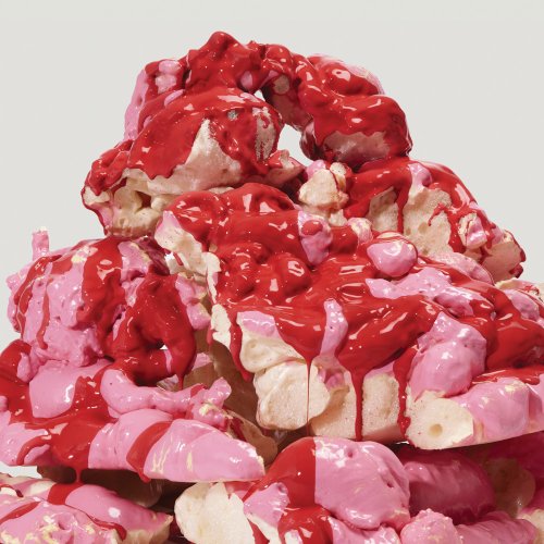 Close-up of a textured, pink and red abstract sculpture.