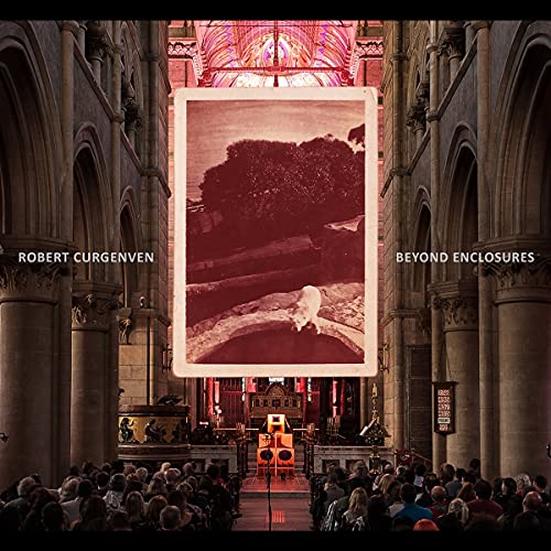 CD cover: interior cathedral view with projected landscape and audience.
