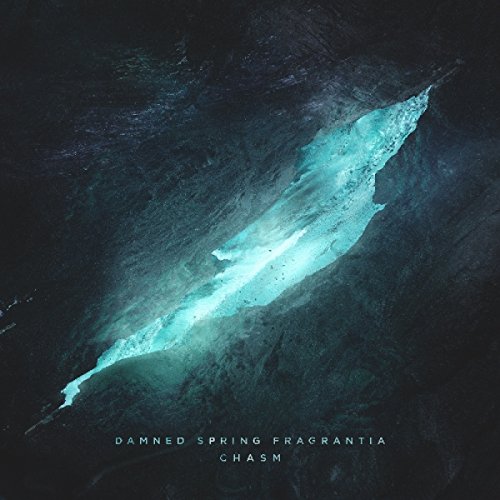 CD cover: dark, textured rock with a bright, glowing blue crevice.