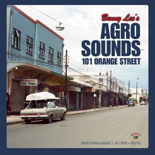 CD cover for Bunny Lee’s “Agro Sounds” featuring a Jamaican street scene.