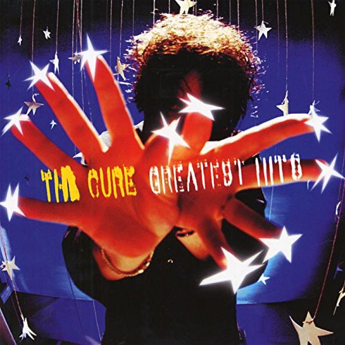 CD cover for The Cure’s “Greatest Hits” featuring a hand and stars.