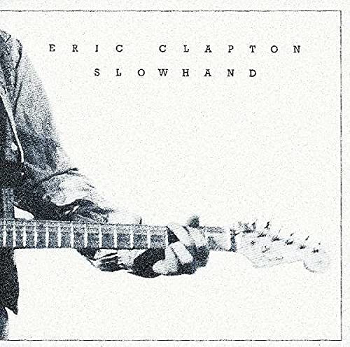 Black and white album cover showing Eric Clapton playing an electric guitar.