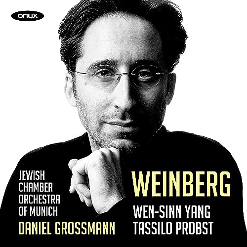CD cover featuring a black and white portrait of a man with glasses.