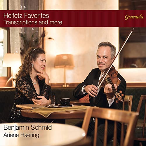 CD cover featuring a violinist and pianist in a cafe setting.