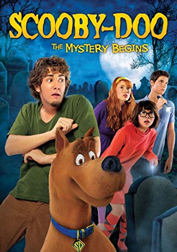 Scooby-Doo movie poster featuring the gang in a spooky graveyard.