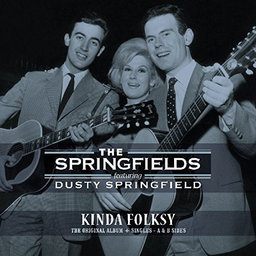 Black and white photo of The Springfields posing with acoustic guitars.