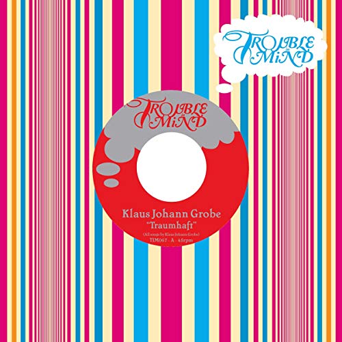 Vinyl record cover with colorful stripes and “Trouble Mind” logo.