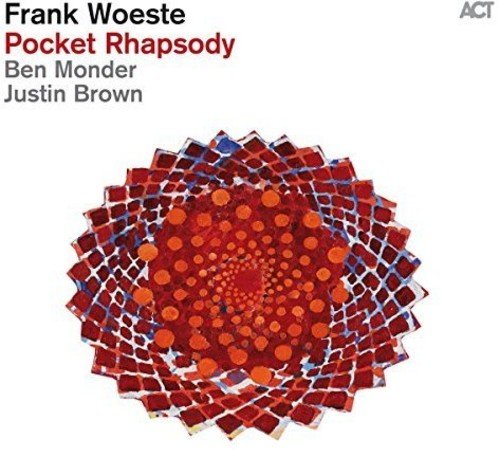 CD cover featuring text and a circular, geometric pattern of red and orange dots.