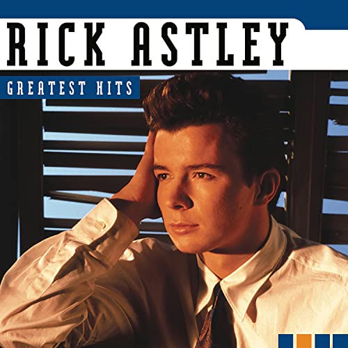 Rick Astley’s “Greatest Hits” CD cover featuring a portrait of the singer.
