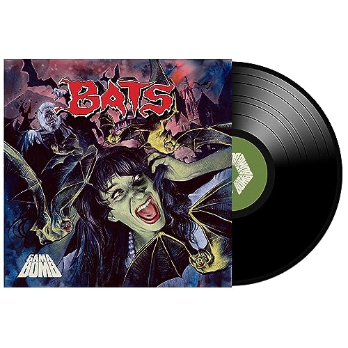 Horror-themed vinyl record cover with bats, a castle, and screaming figures.