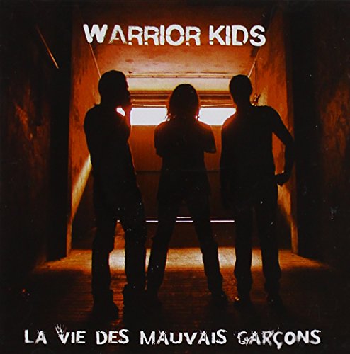 Silhouetted figures stand in a brightly lit tunnel, album cover art.