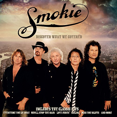 Smokie band album cover with city skyline background.