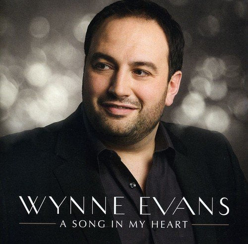 Wynne Evans album cover: portrait of a smiling man in a suit.